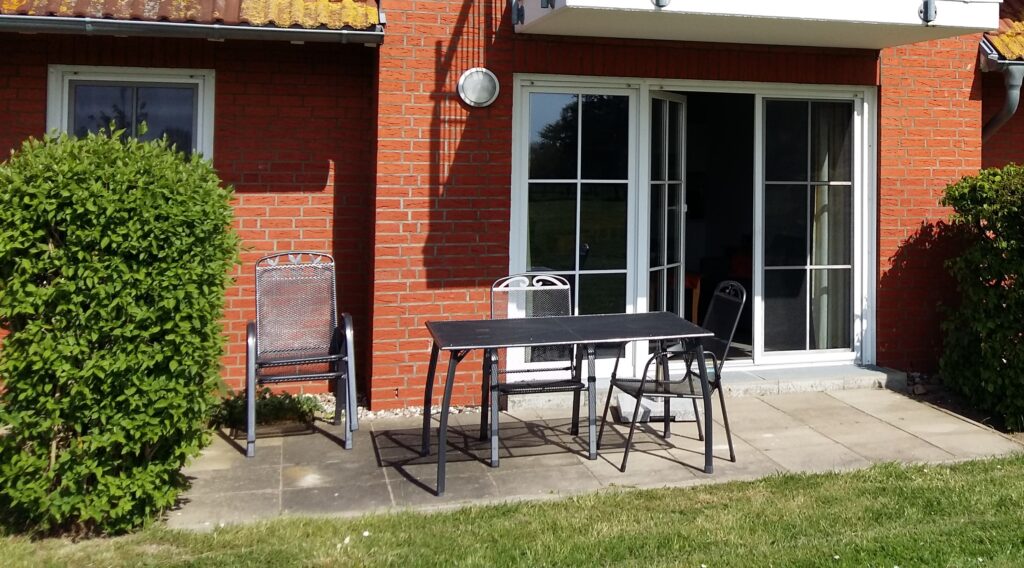 Terrassenseite der 56-qm-Ferienwohnung